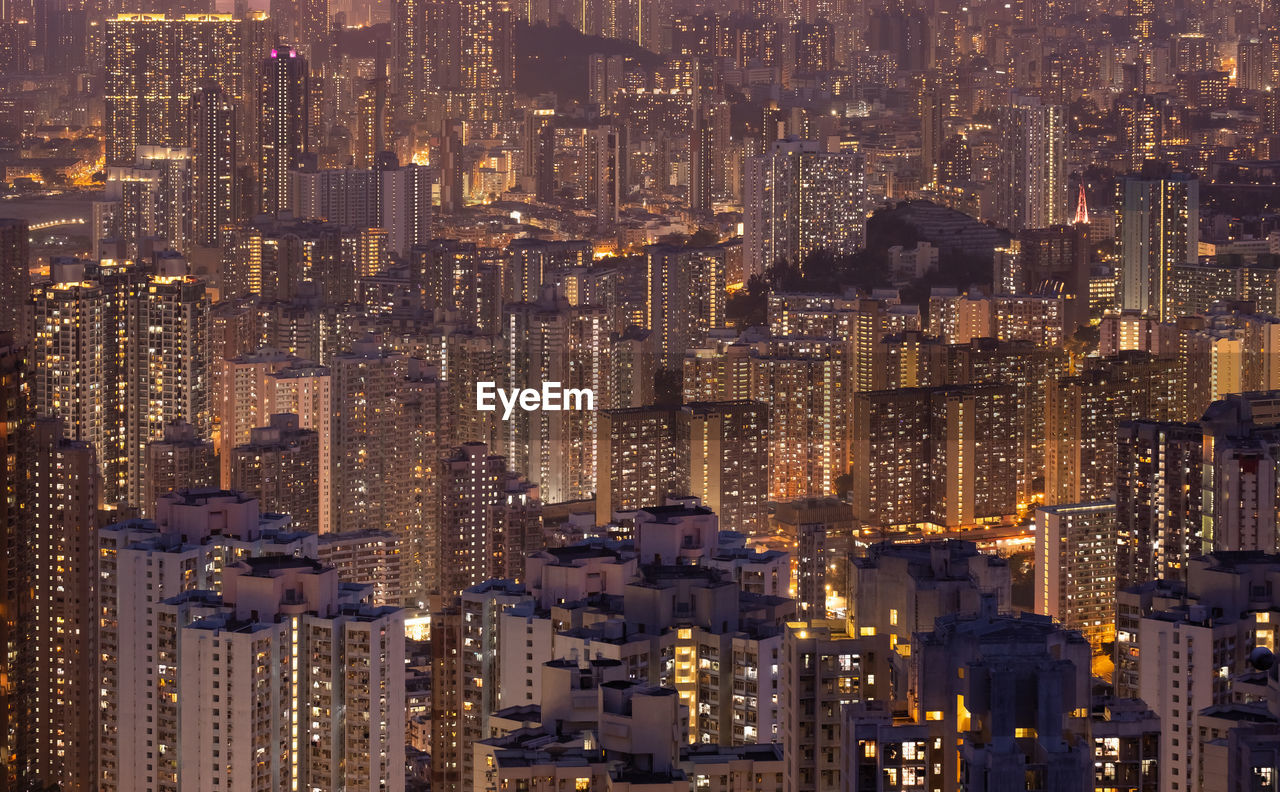 High angle view of skyscraper and high-rise buildings in hong kong. night city.