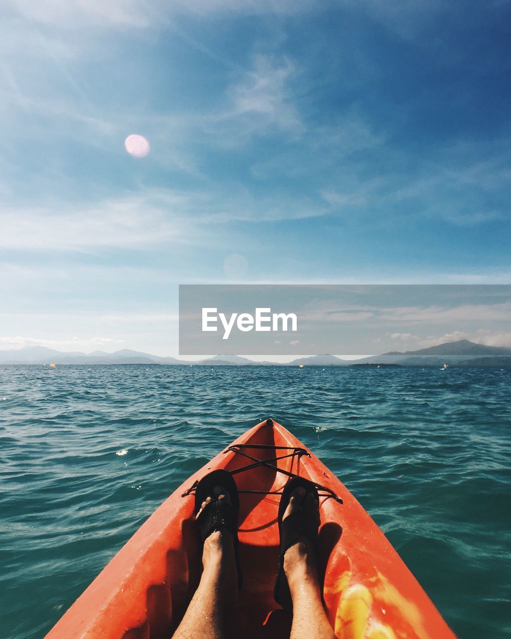 Low section of man on kayak