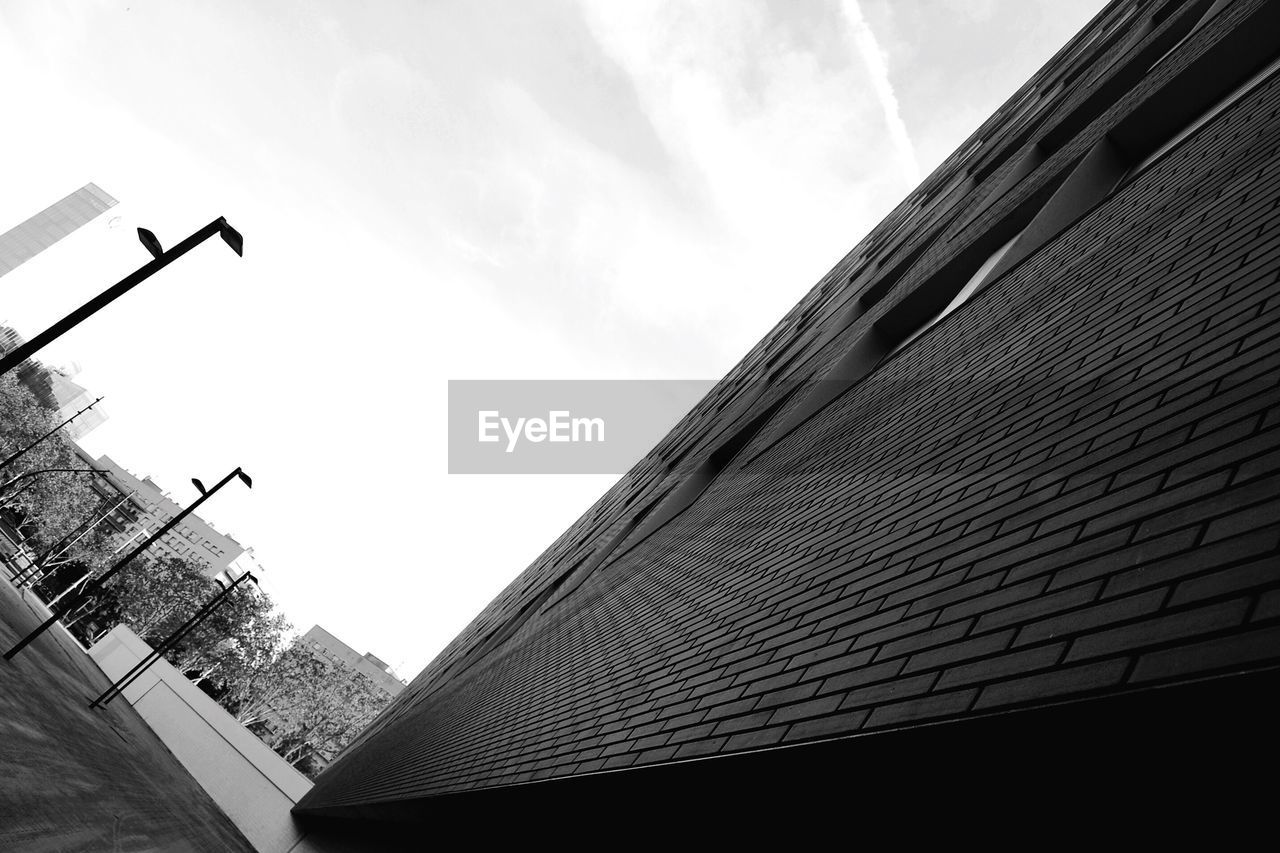 LOW ANGLE VIEW OF BUILDINGS AGAINST SKY