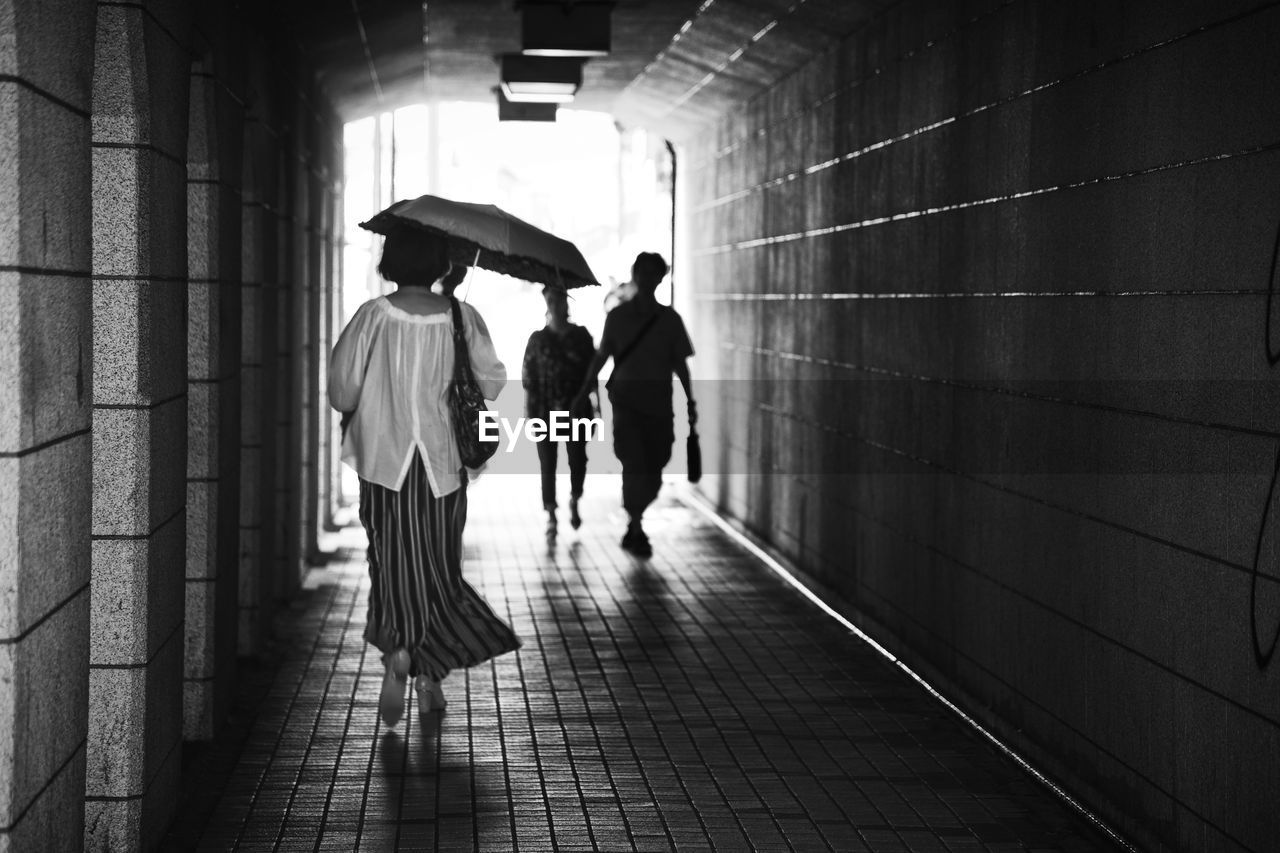 Japan Photography Blackandwhite Day Lifestyles Light And Shadow Monochrome Passage People Streetphotography Walking Women