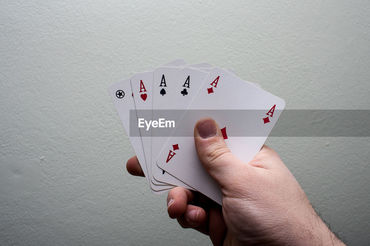 CLOSE-UP OF HAND ON THE TABLE