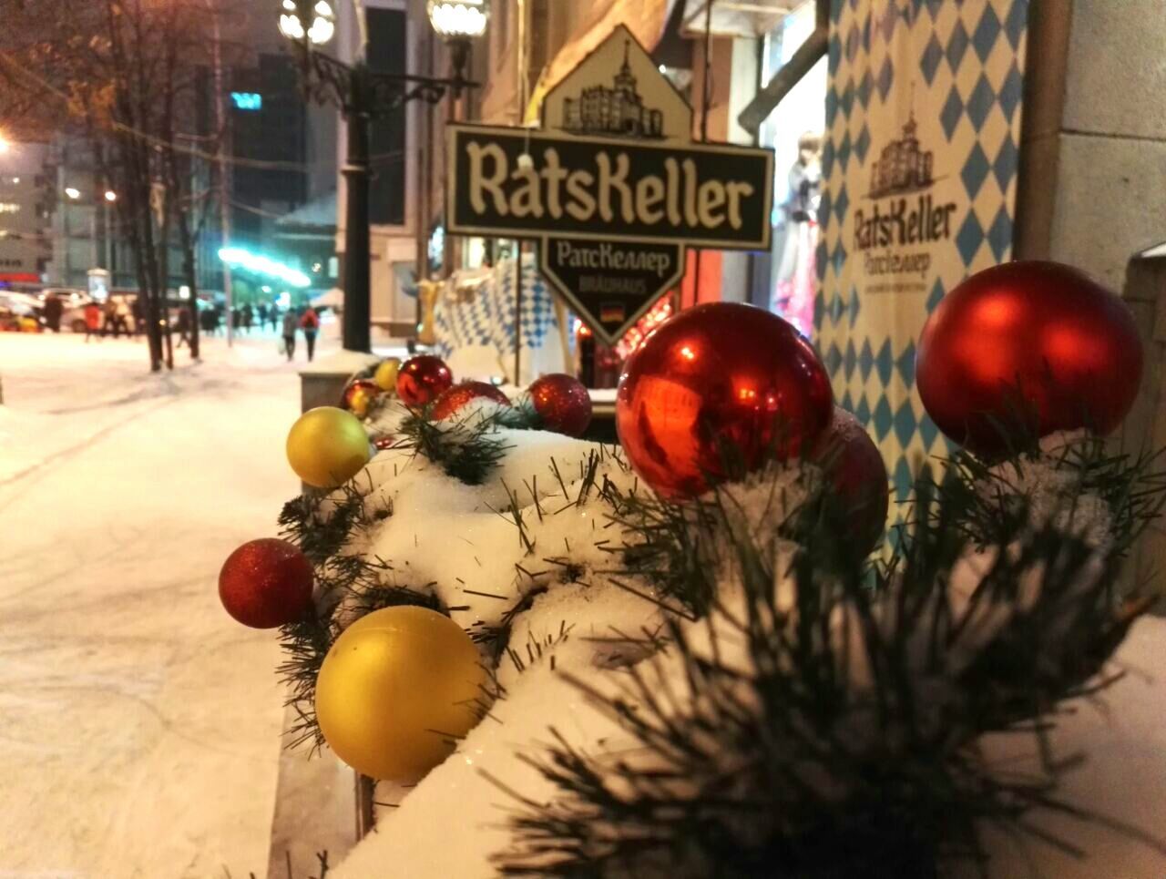 CLOSE-UP OF CHRISTMAS DECORATIONS ON STREET