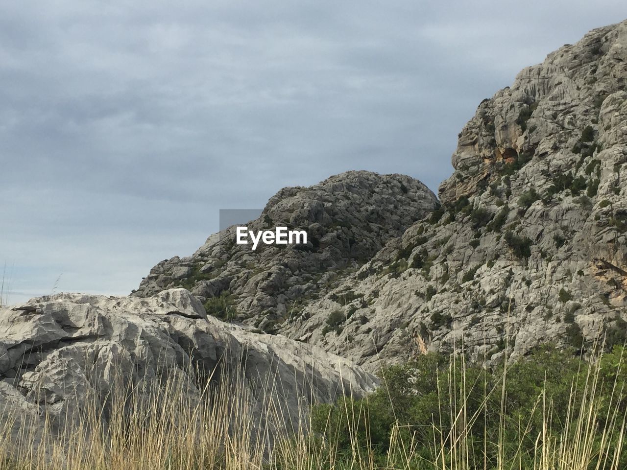 Scenic view of rocky mountains against sky