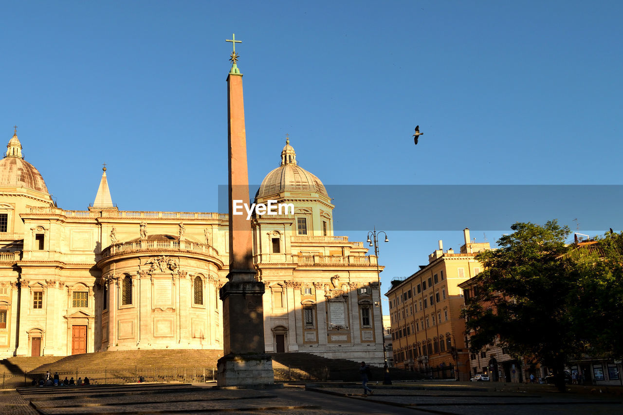 VIEW OF HISTORICAL BUILDING AGAINST CLEAR BLUE SKY