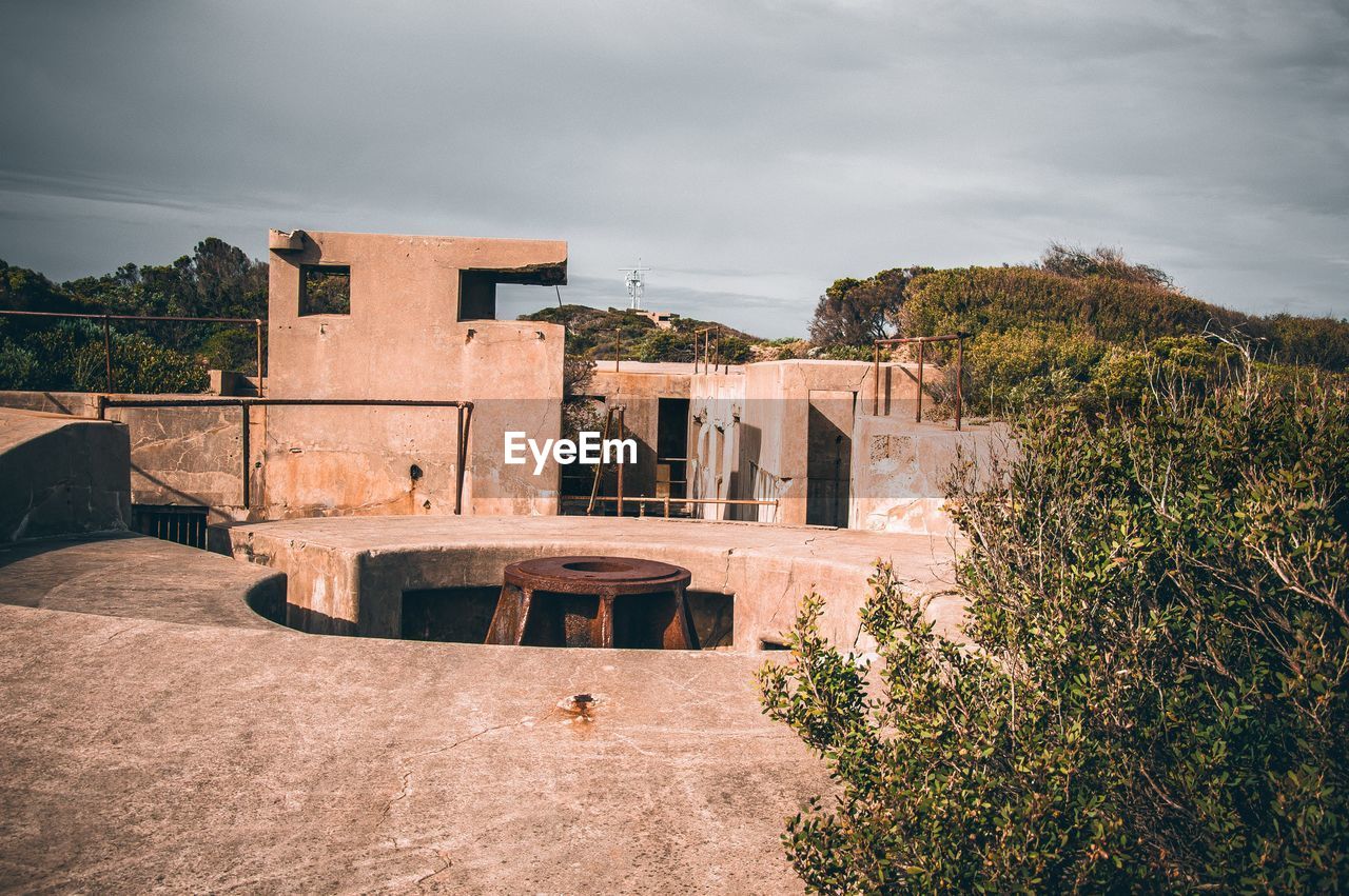 ABANDONED BUILDING AGAINST SKY