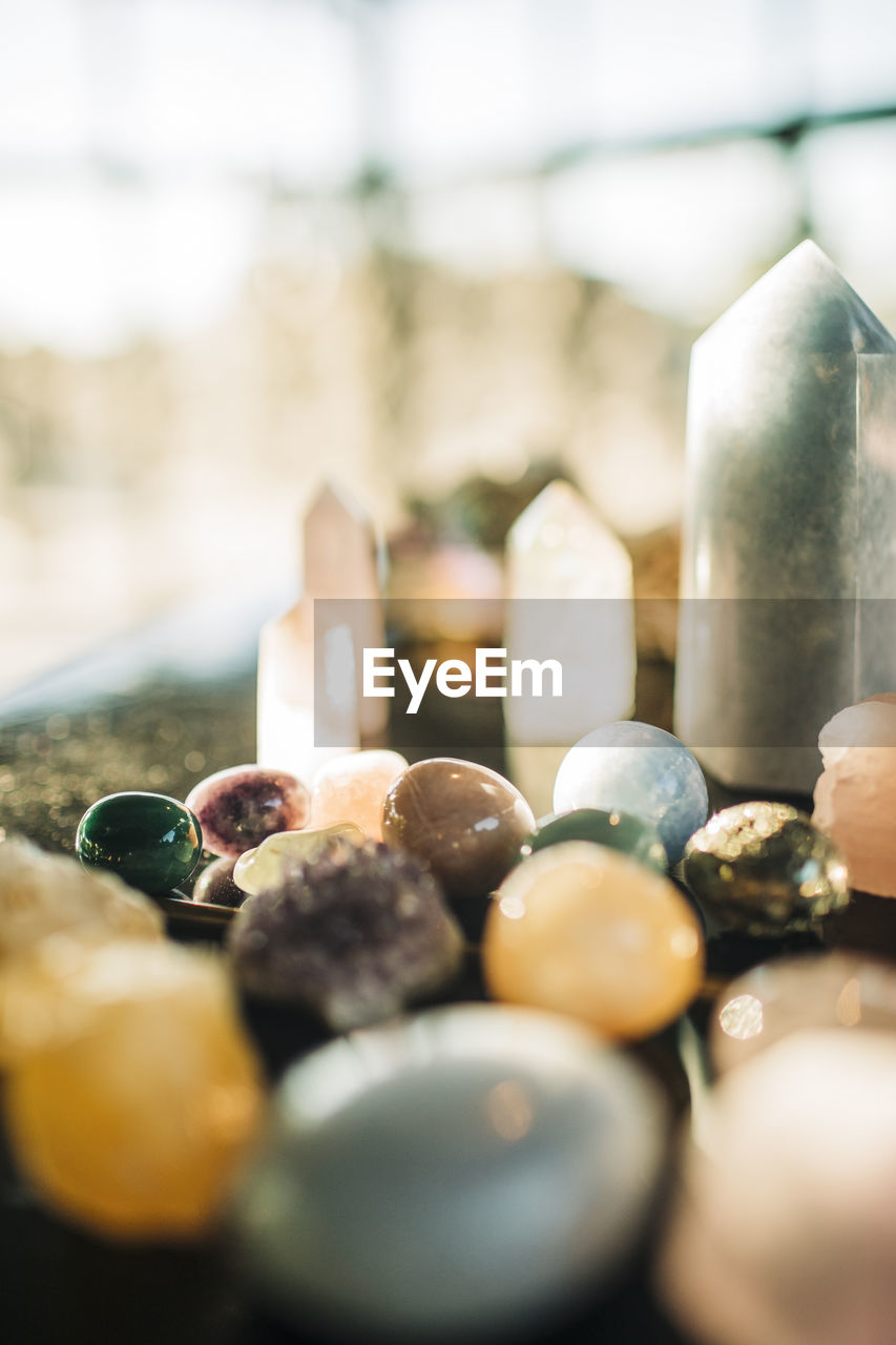 Variety of gemstones arranged on table at retreat center