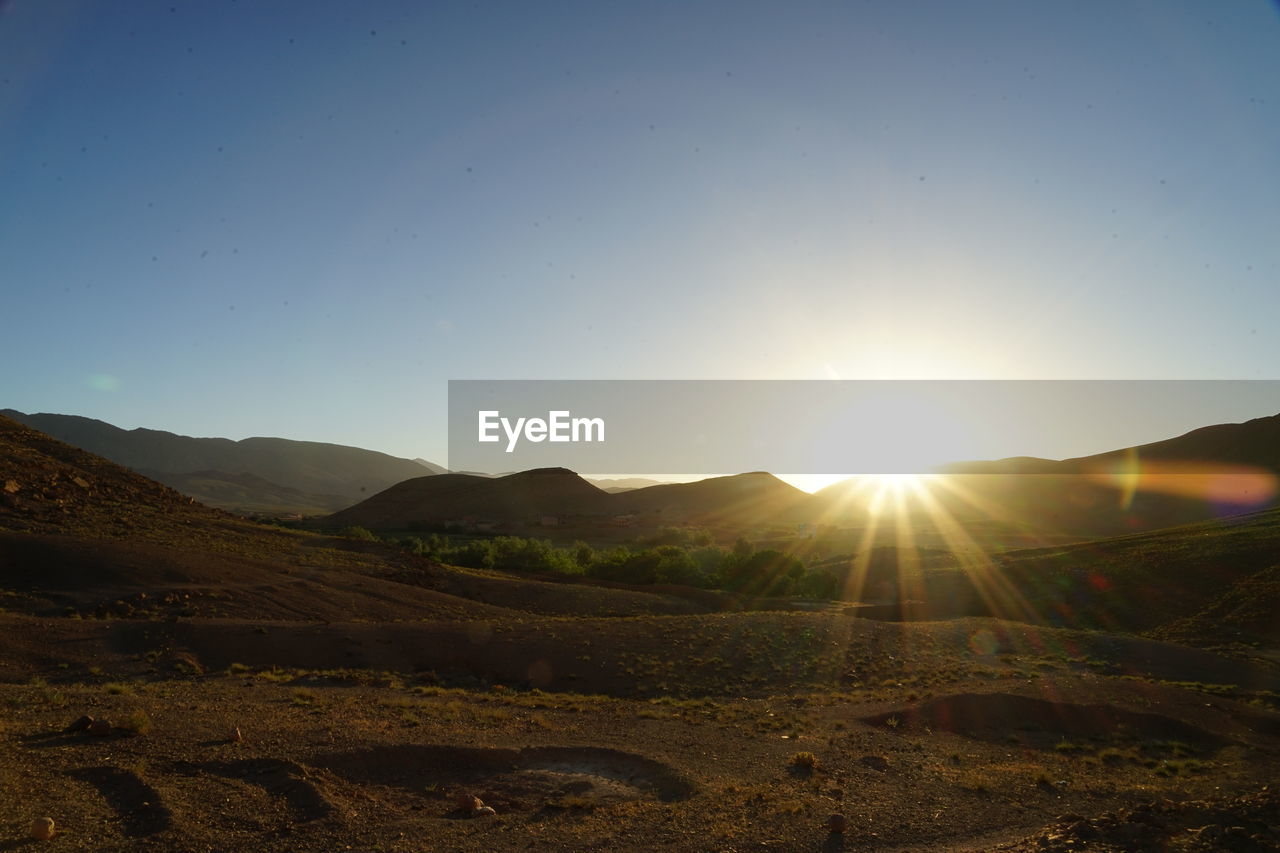 Scenic view of atlas mountains against sky during sunset