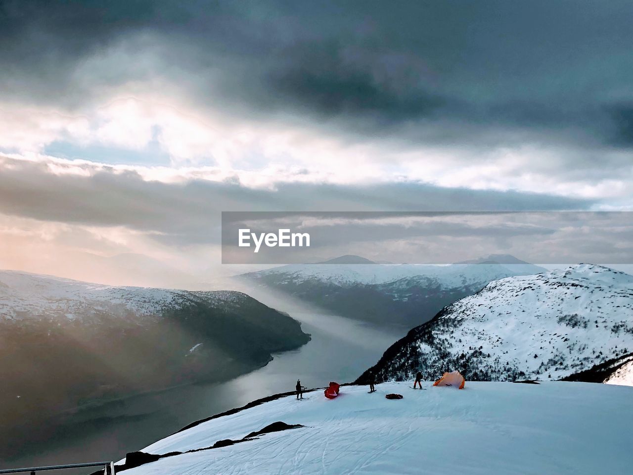 Scenic view of snowcapped mountains against sky