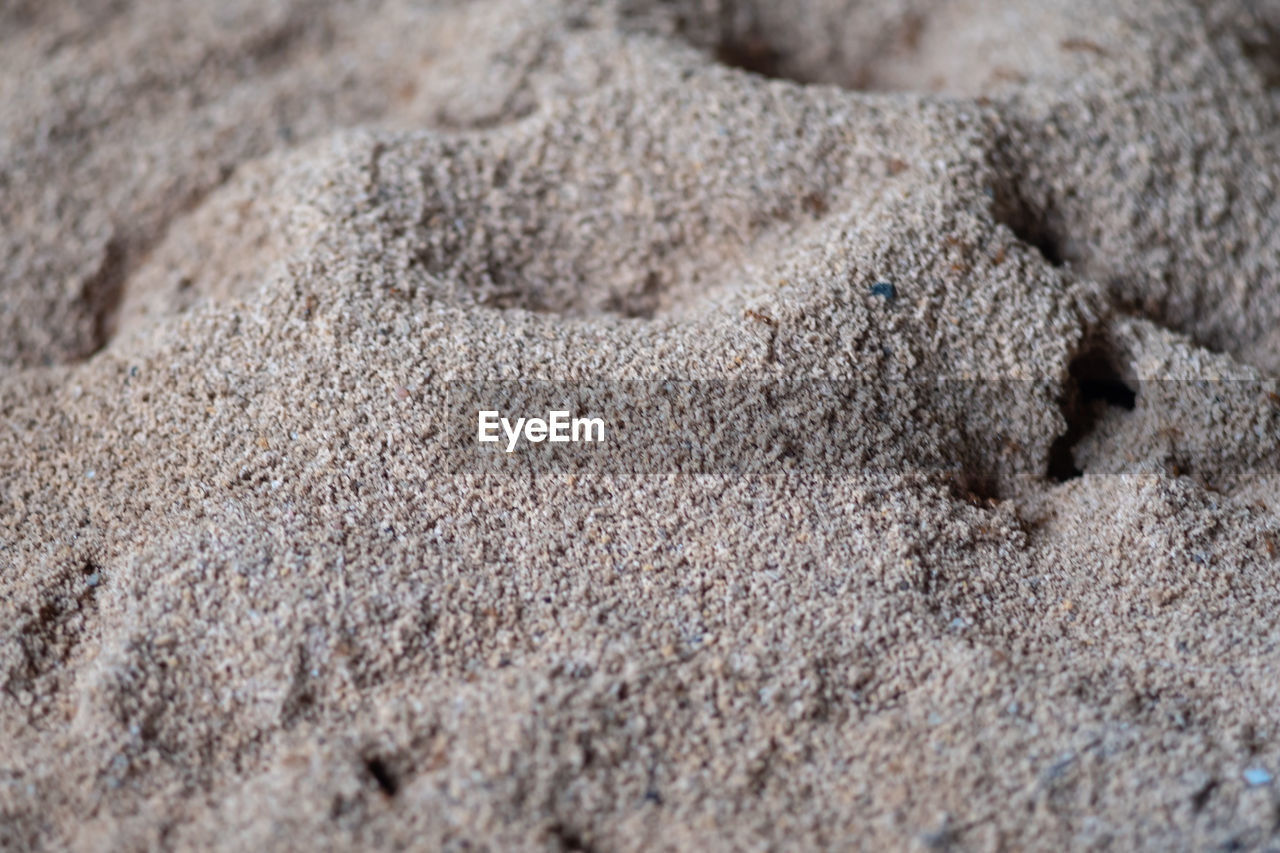 FULL FRAME SHOT OF A SAND ON BEACH