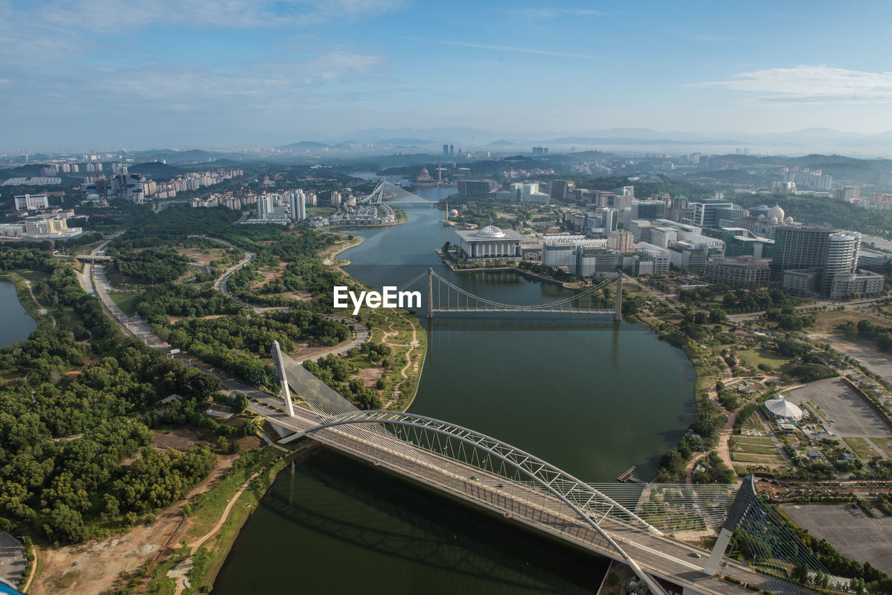 High angle view of city at riverbank