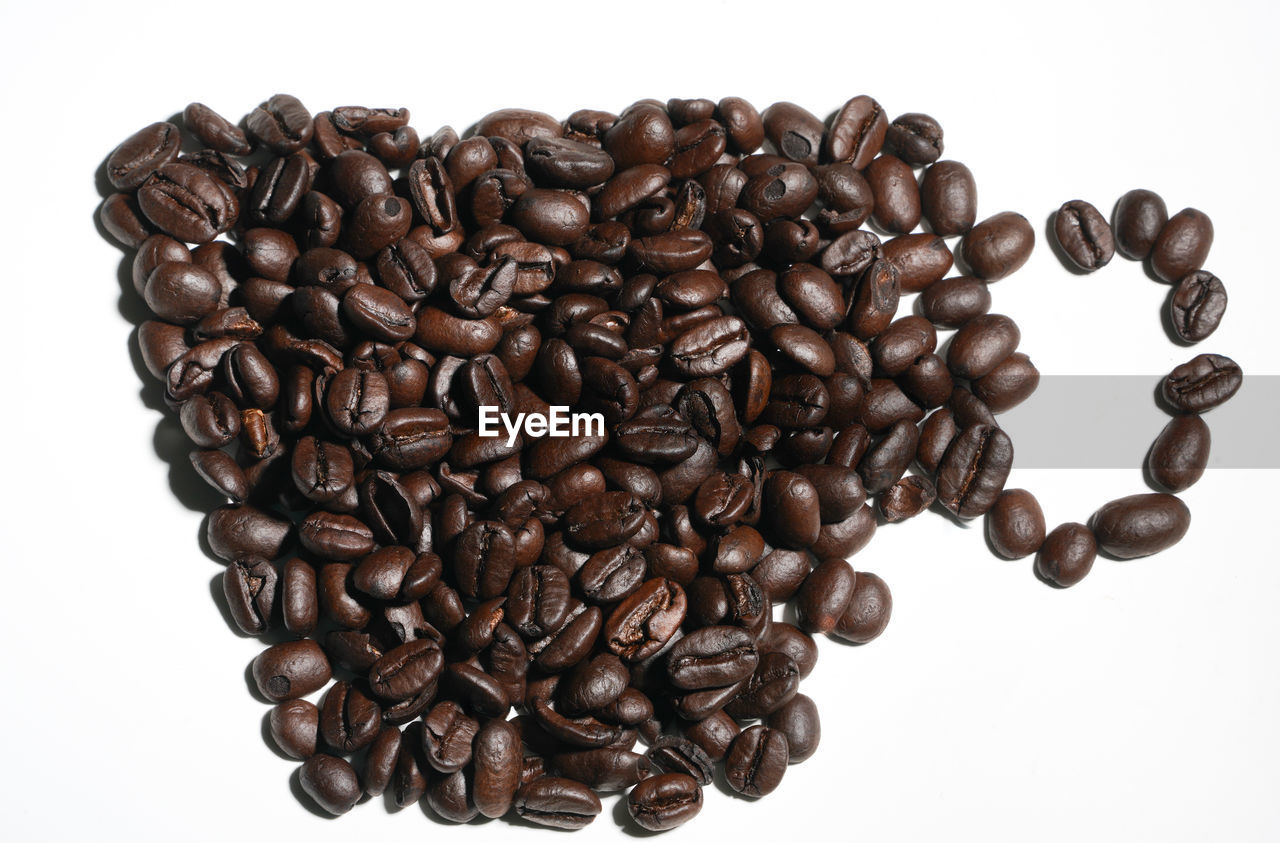 HIGH ANGLE VIEW OF COFFEE BEANS IN BACKGROUND