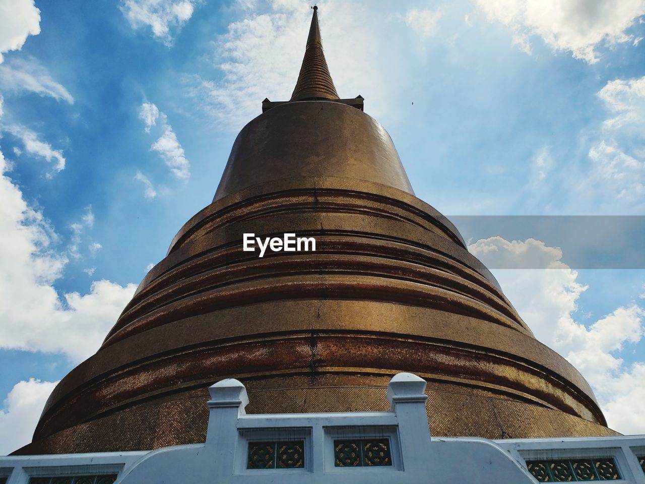 LOW ANGLE VIEW OF TEMPLE AGAINST BUILDING