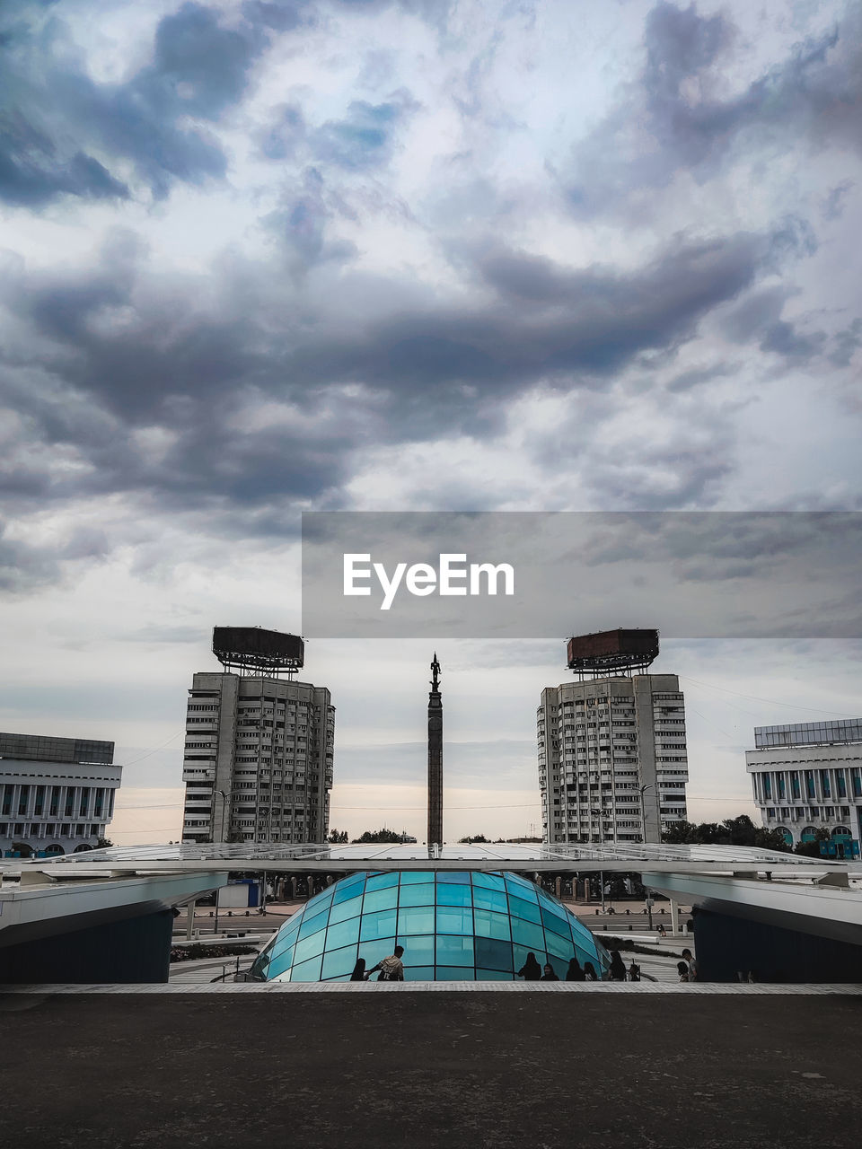 architecture, sky, built structure, building exterior, city, cloud, urban area, blue, building, skyline, skyscraper, office building exterior, cityscape, nature, travel destinations, reflection, horizon, no people, day, travel, outdoors, landmark, office, urban skyline, landscape, downtown, city life
