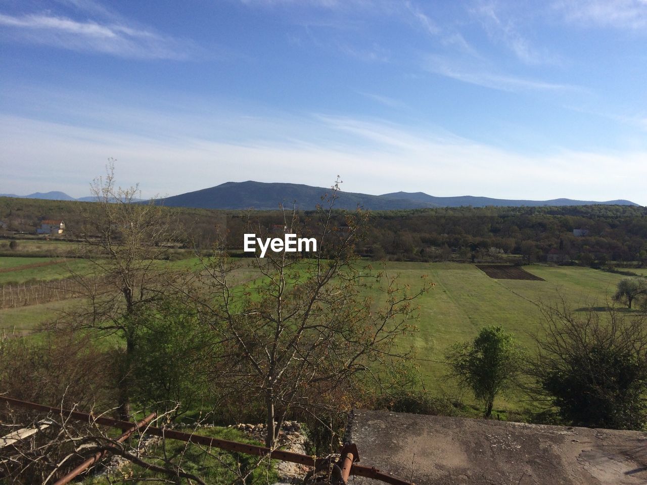 High angle view of agricultural fields at mountain