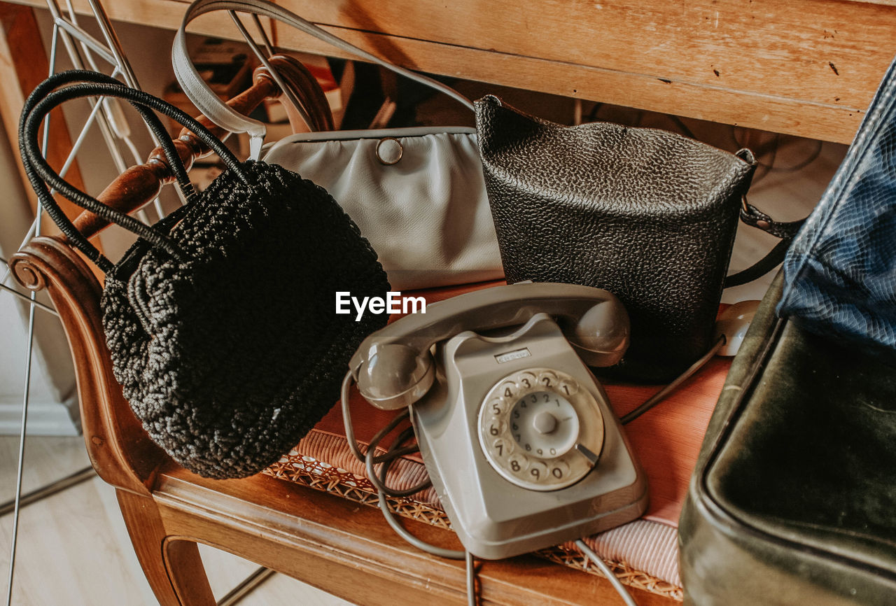 High angle view of telephone on table at home