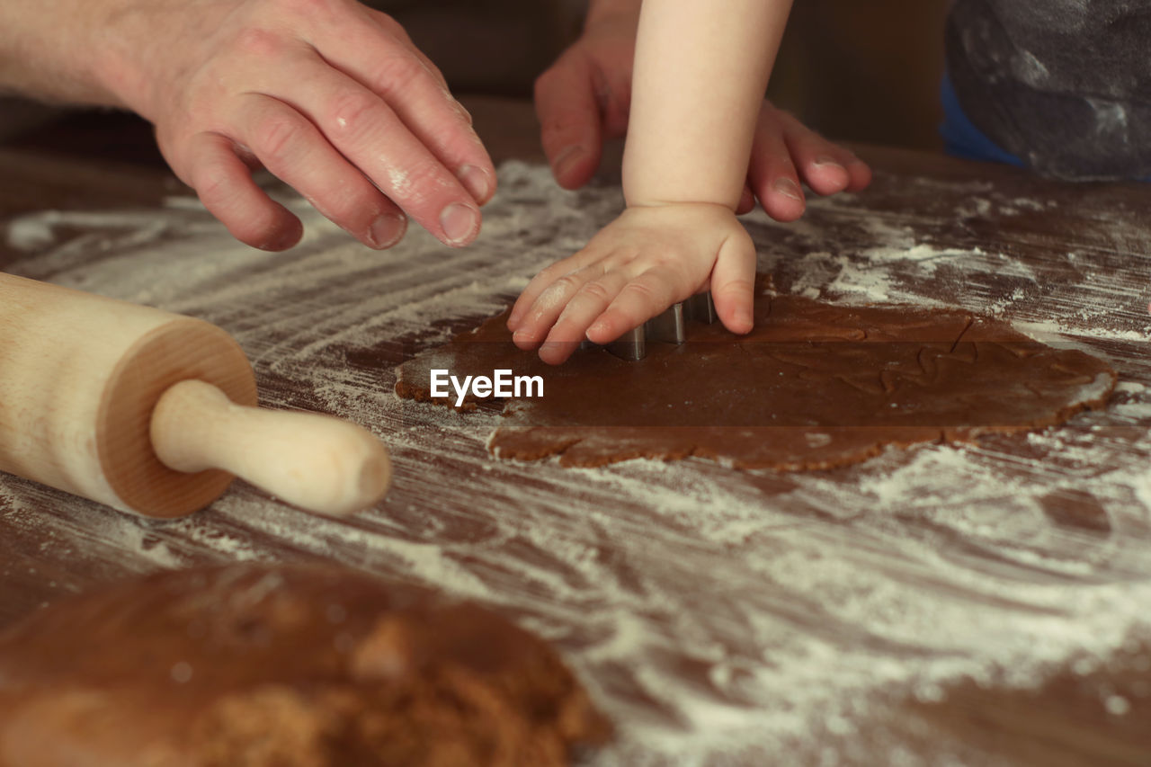 Cropped image of person preparing food on table