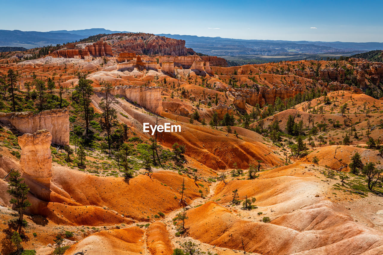 SCENIC VIEW OF LANDSCAPE WITH MOUNTAIN RANGE