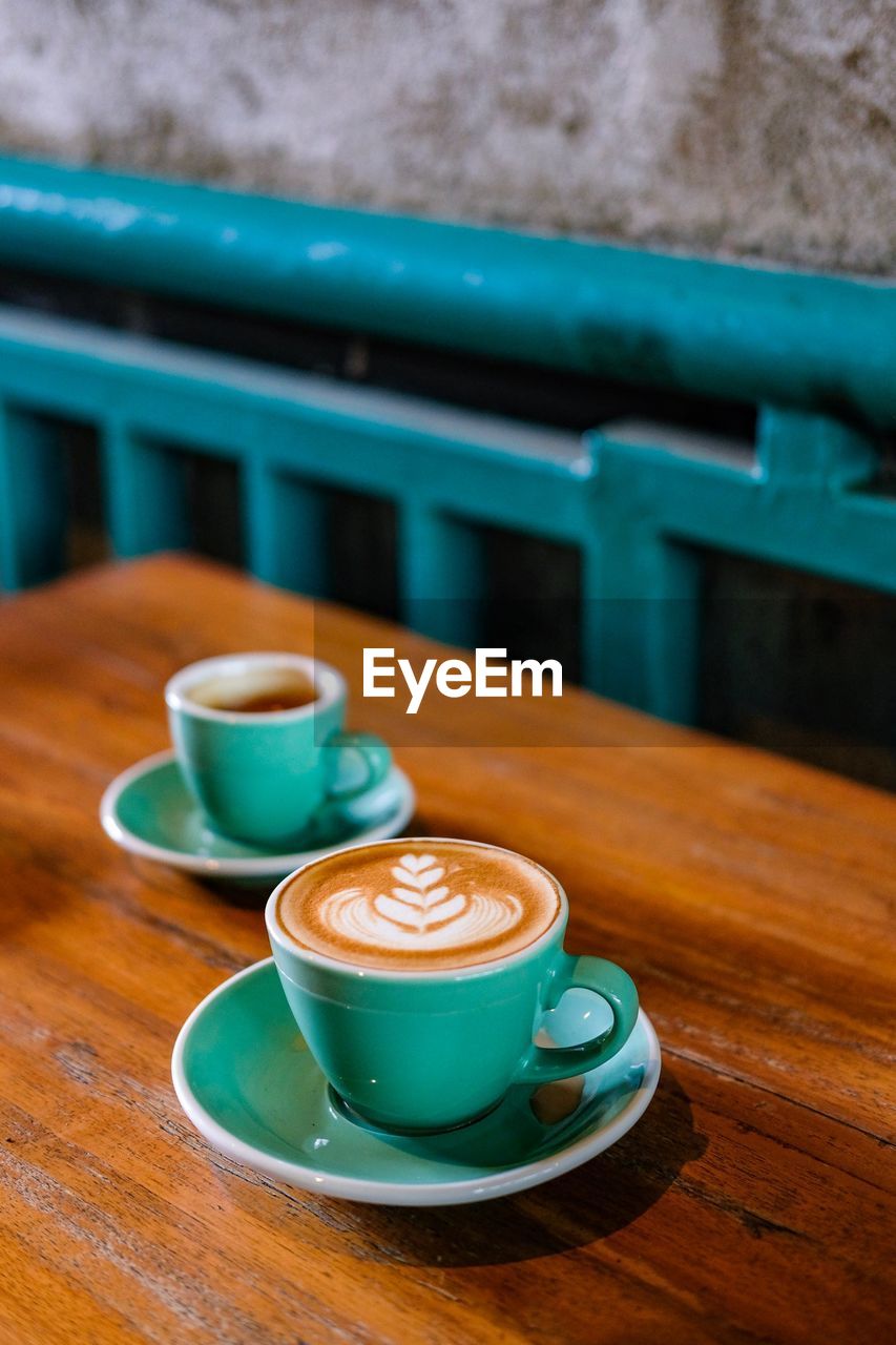 Coffee cups on table