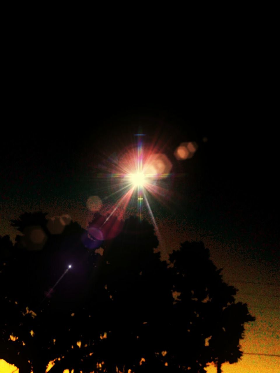 LOW ANGLE VIEW OF ILLUMINATED STREET LIGHT