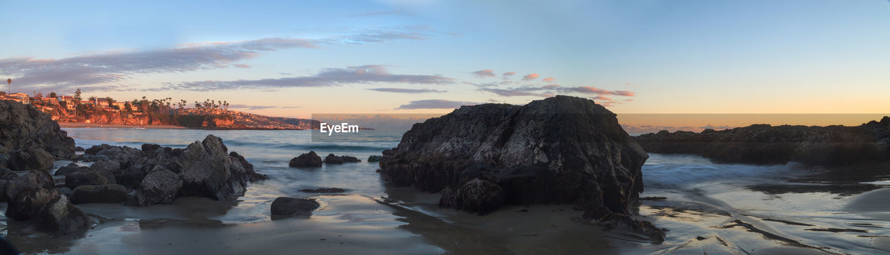 Scenic view of sea at sunset