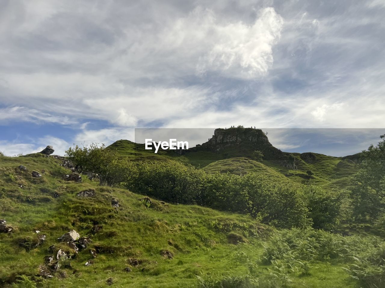 nature, environment, sky, cloud, landscape, mountain, scenics - nature, plant, land, beauty in nature, mountain range, tree, green, highland, meadow, tranquility, no people, non-urban scene, grass, travel, forest, wilderness, travel destinations, plateau, tranquil scene, outdoors, rural area, tourism, ridge, day, summer, valley, rural scene, idyllic, grassland, field, foliage, lush foliage, vacation, trip, plain