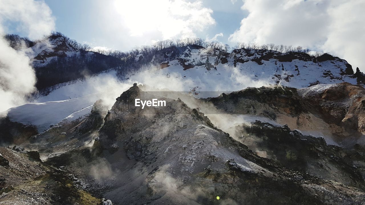 Panoramic view of mountain range against sky