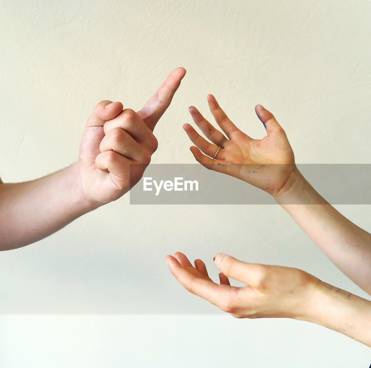 Close-up of hands indicating argument