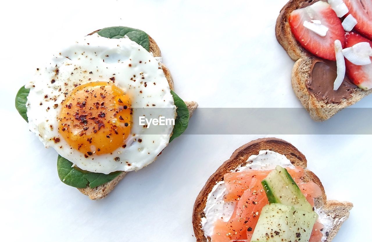 High angle view of breakfast over white background