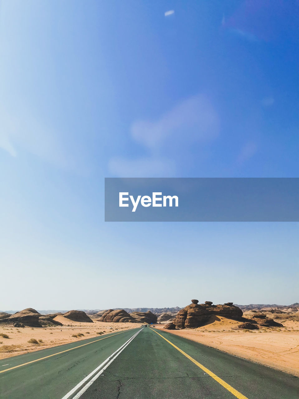 ROAD PASSING THROUGH A DESERT