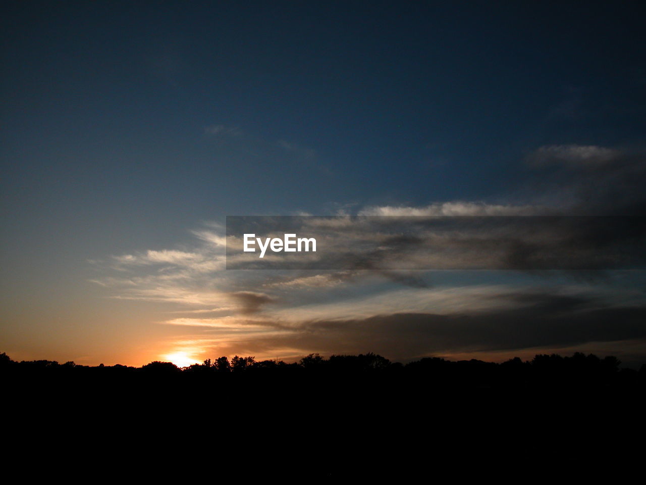 SCENIC VIEW OF SILHOUETTE SKY DURING SUNSET