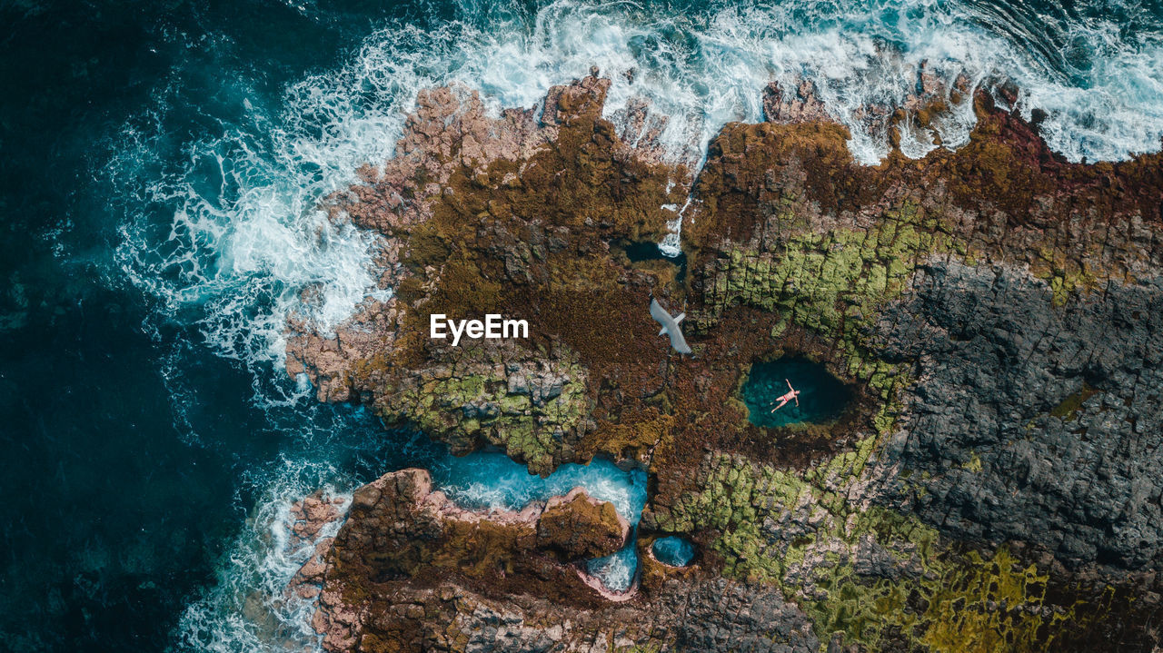 Aerial view of sea and rock formations