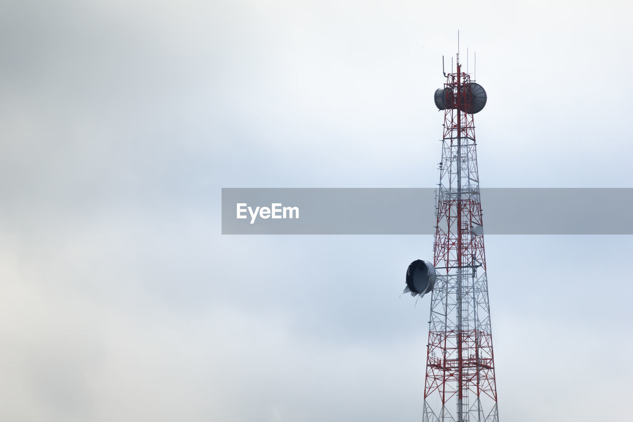 LOW ANGLE VIEW OF TELEPHONE POLE AGAINST SKY