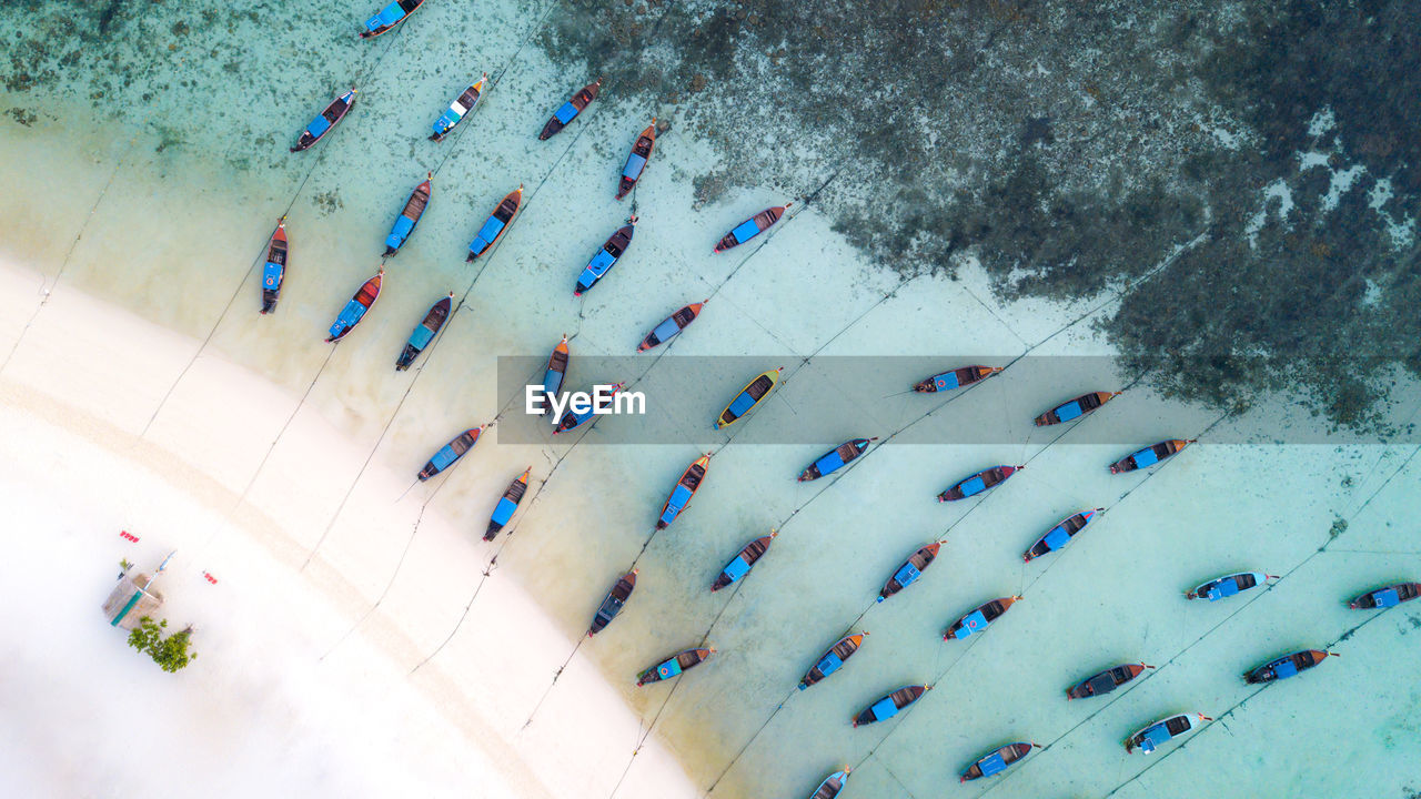 Aerial view of boats moored in sea