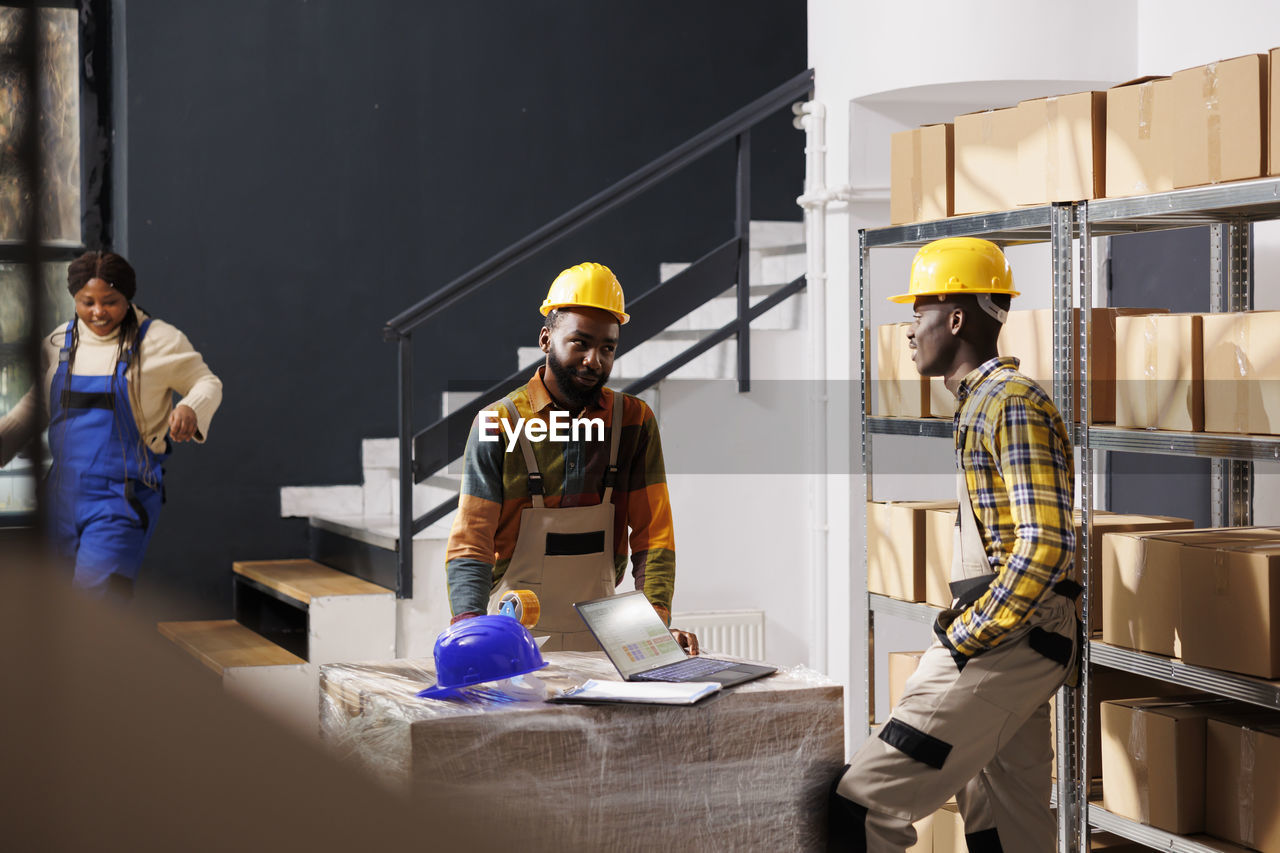 rear view of man working on table