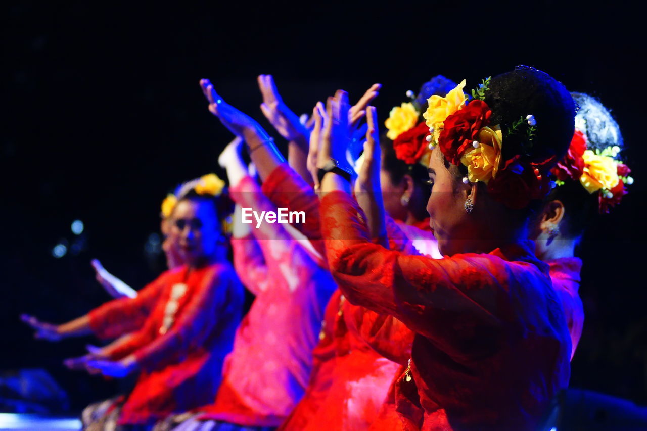 GROUP OF PEOPLE DANCING