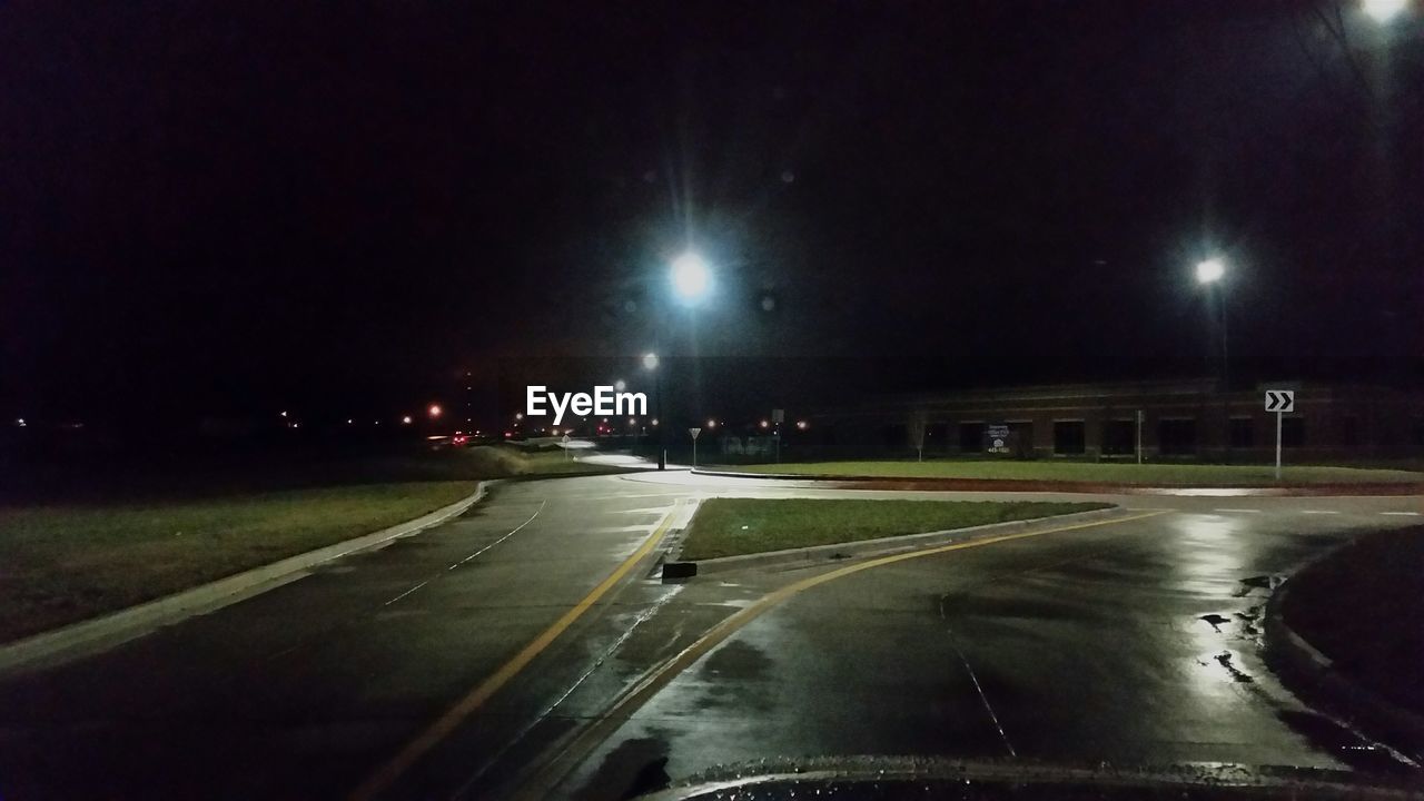 VIEW OF ROAD AT NIGHT