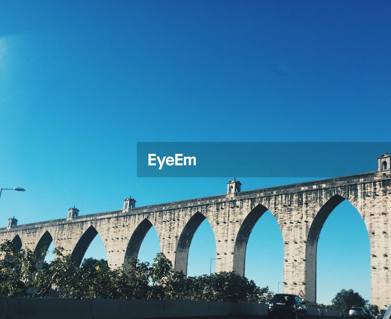 LOW ANGLE VIEW OF BRIDGE AGAINST SKY