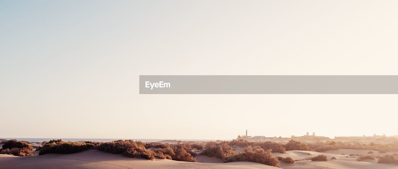 SCENIC VIEW OF CITY AGAINST CLEAR SKY