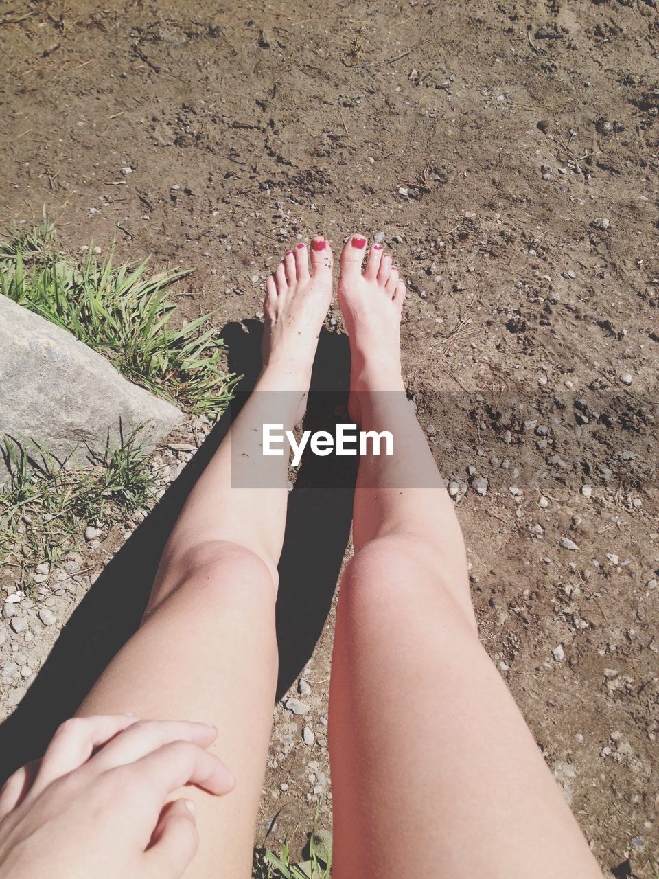 Naked legs in sun