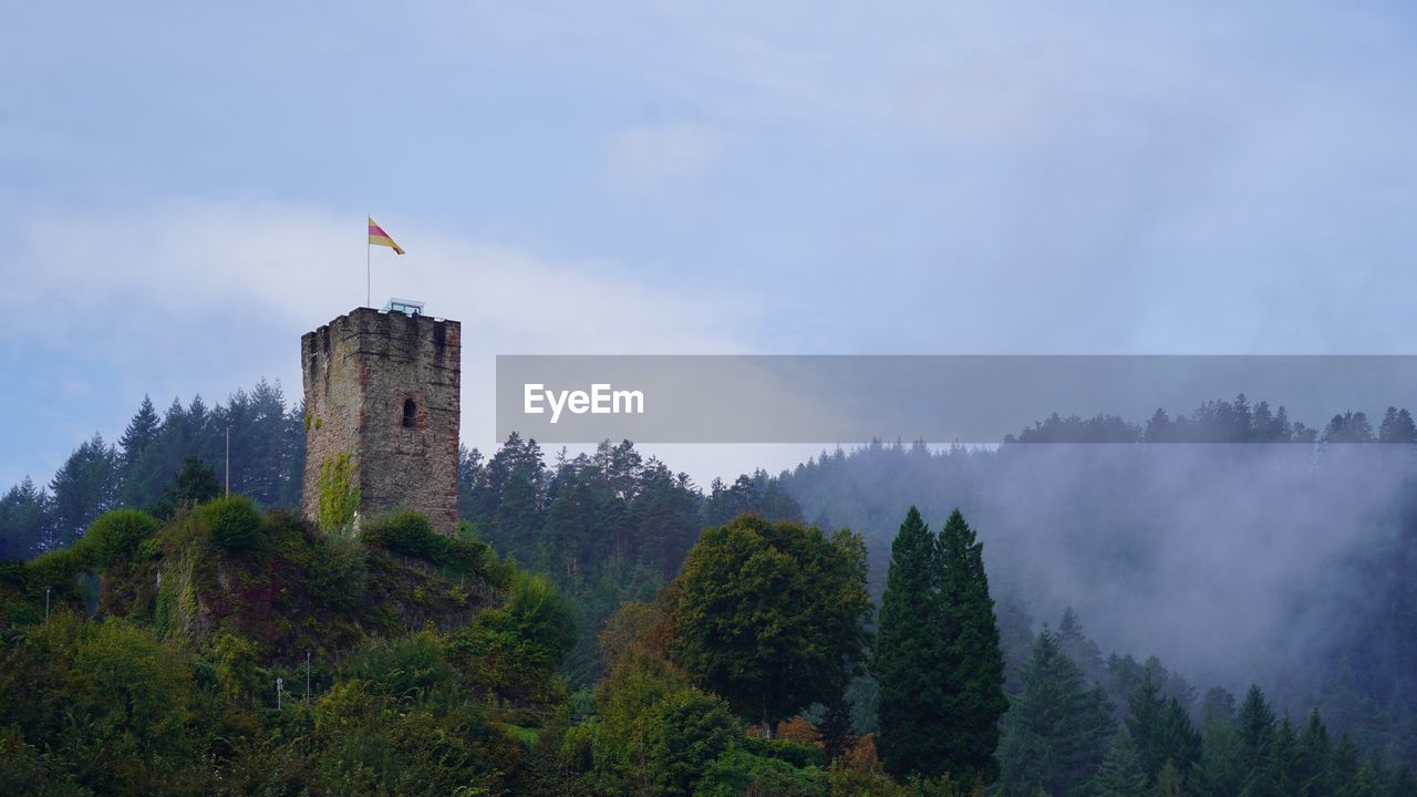 Old ruin tower with morning fog