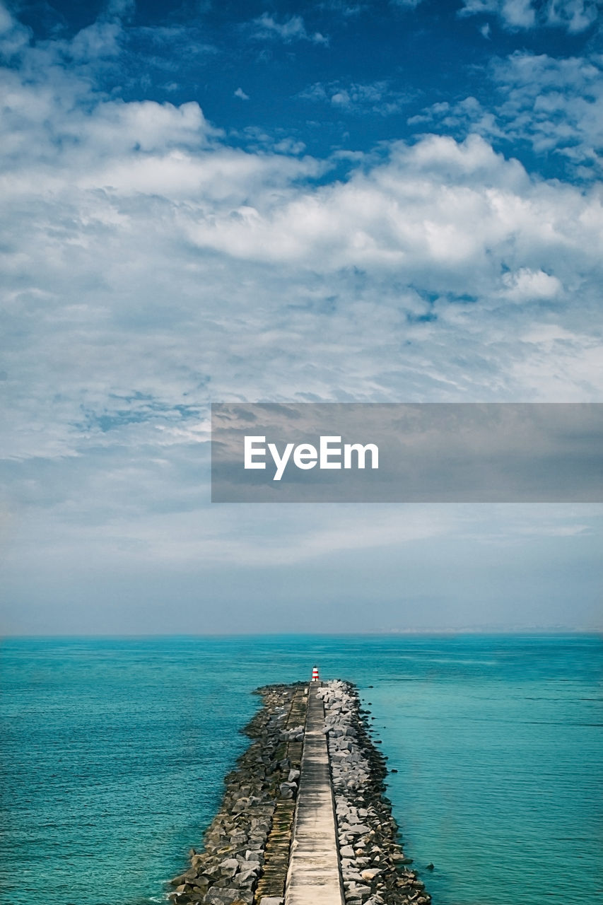 Scenic view of pier over sea against sky