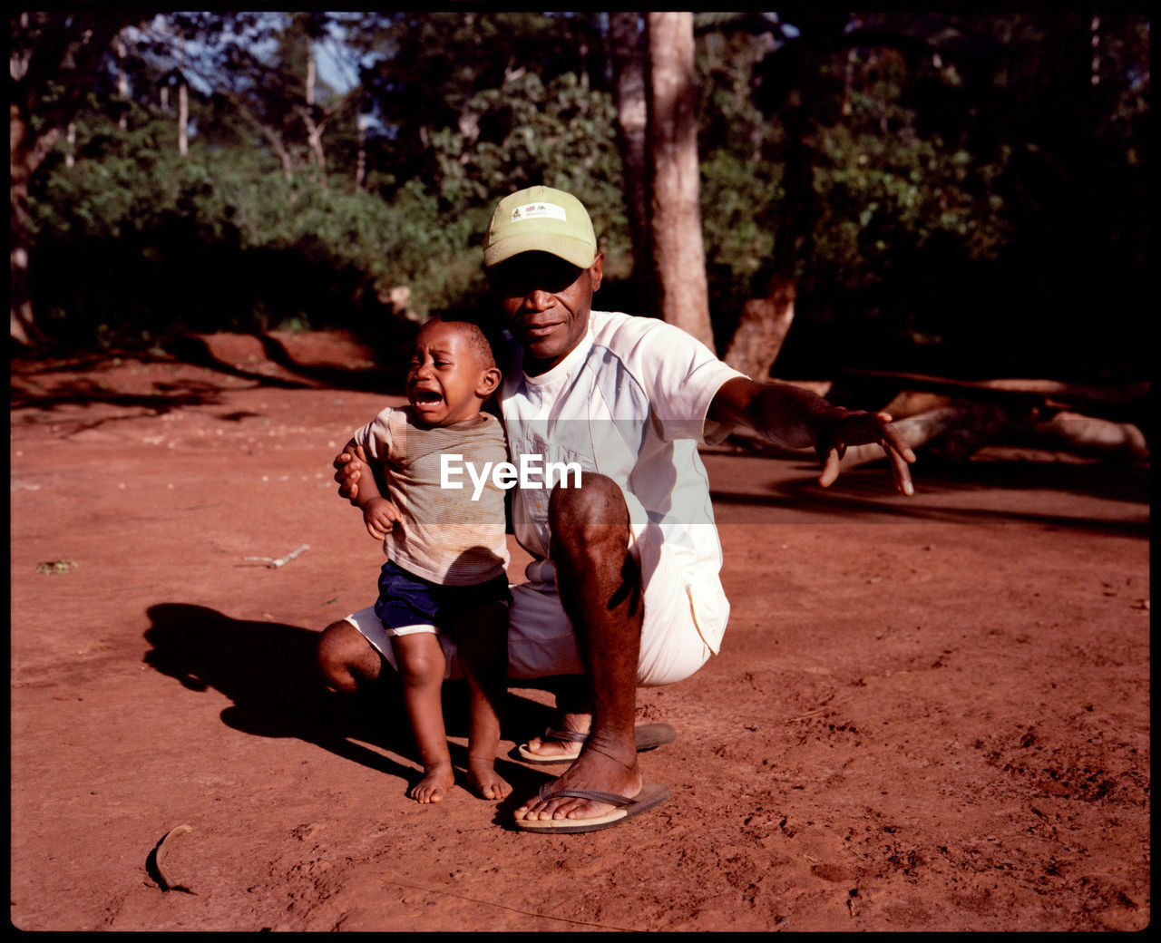 men, two people, full length, adult, childhood, child, transfer print, togetherness, family, person, nature, auto post production filter, tree, casual clothing, smiling, lifestyles, emotion, human face, day, clothing, parent, bonding, sunlight, outdoors, sitting, leisure activity, human head, female, women, one parent