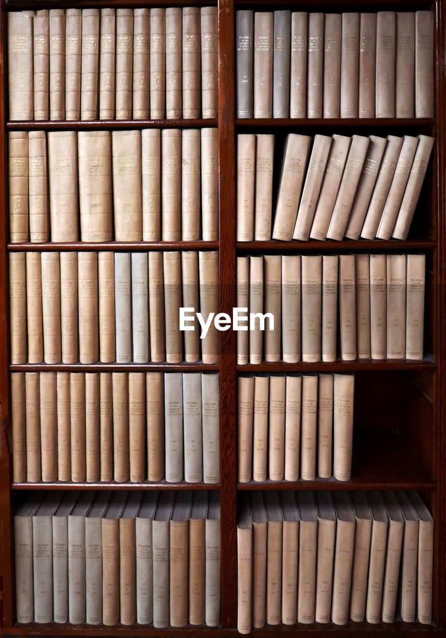 Full frame shot of bookshelf in library