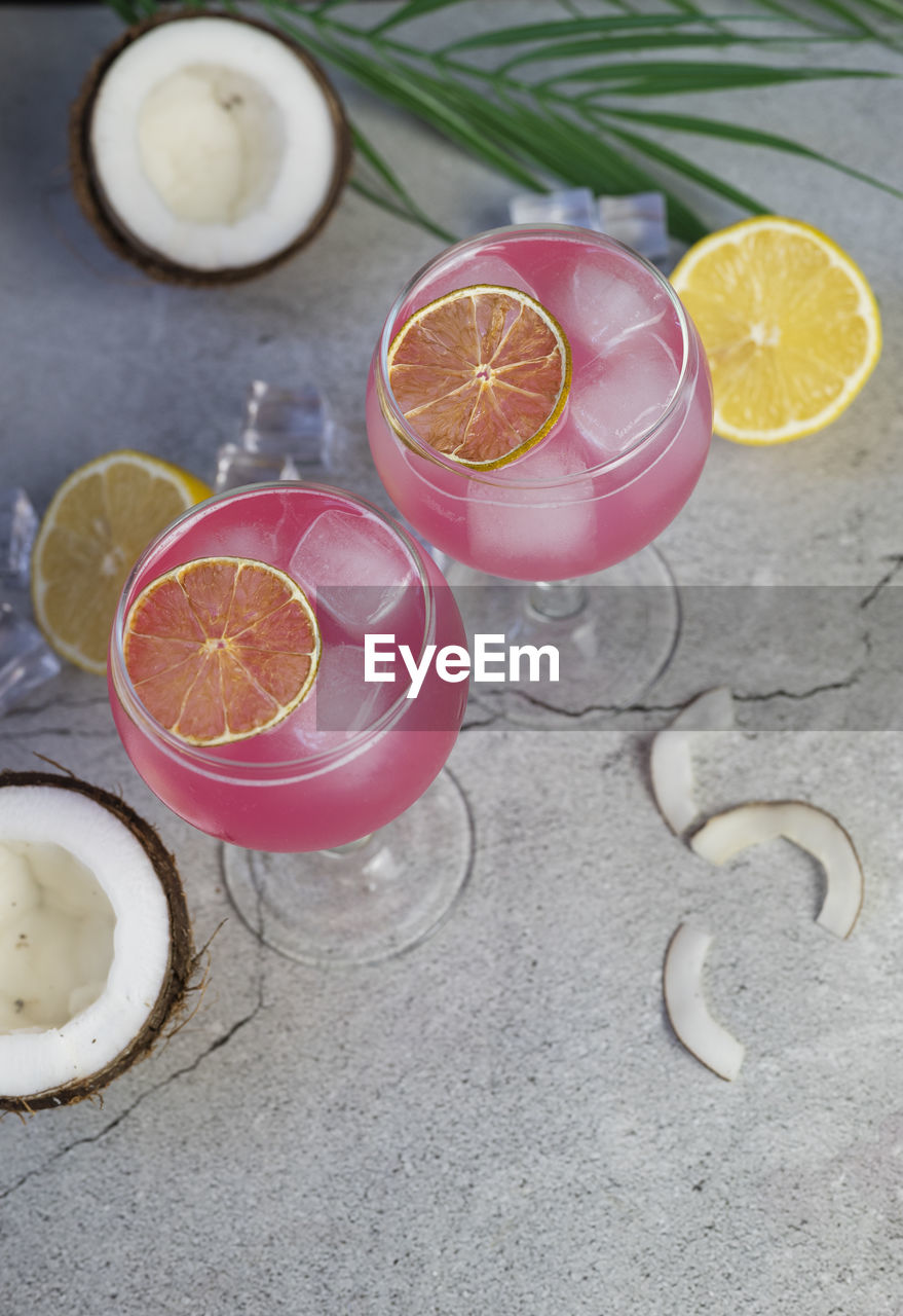 high angle view of fruits and drink on table