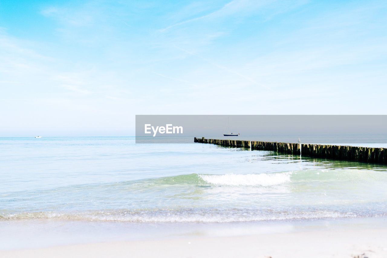Scenic view of beach against sky