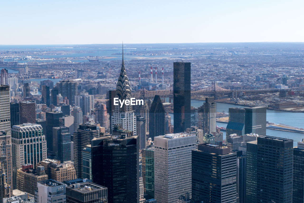 Chrysler building amidst cityscape against sky at manhattan