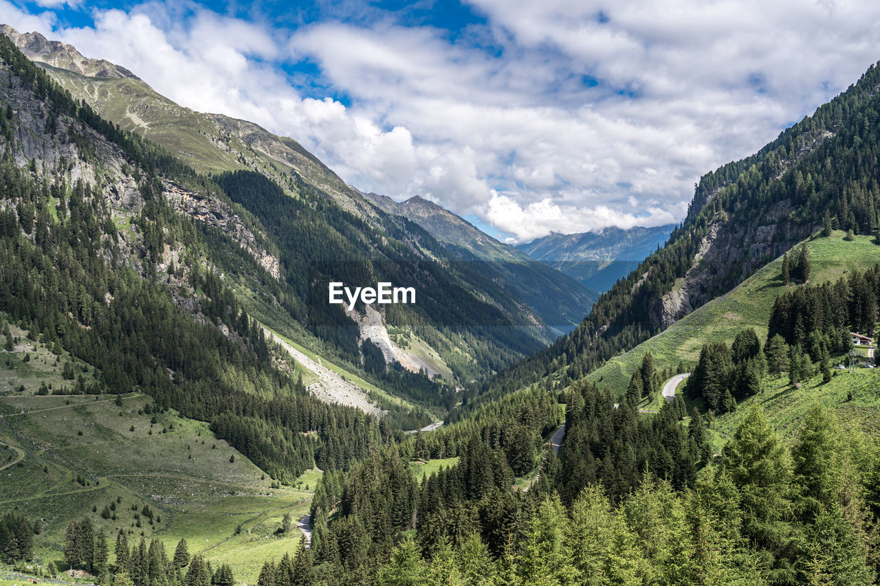 SCENIC VIEW OF MOUNTAIN AGAINST SKY