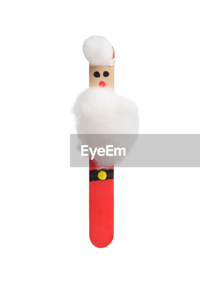 RED TOY ON WHITE BACKGROUND