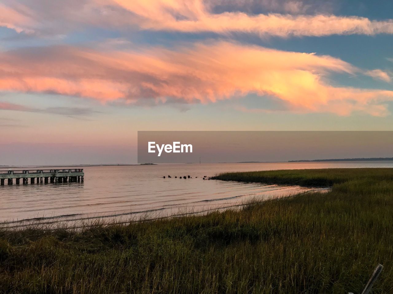 SCENIC VIEW OF SEA DURING SUNSET