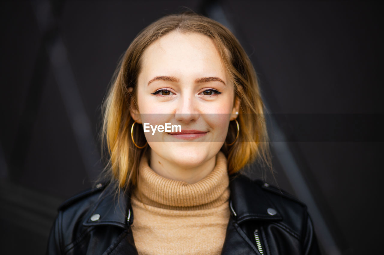 Portrait of smiling young woman